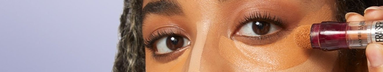 Concealer makeup tutorials illustrative banner image - close up of woman applying concealer under Eye