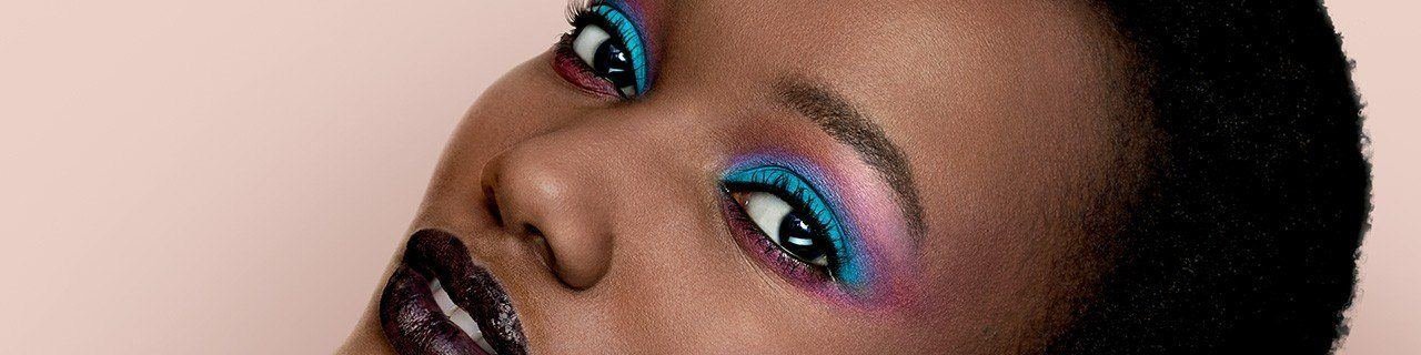 Eyeshadow Makeup Tutorials illustrative banner image - close up of woman wearing Eyeshadow and lipstick